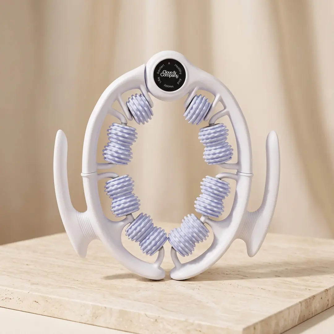A white and light blue roller massager.