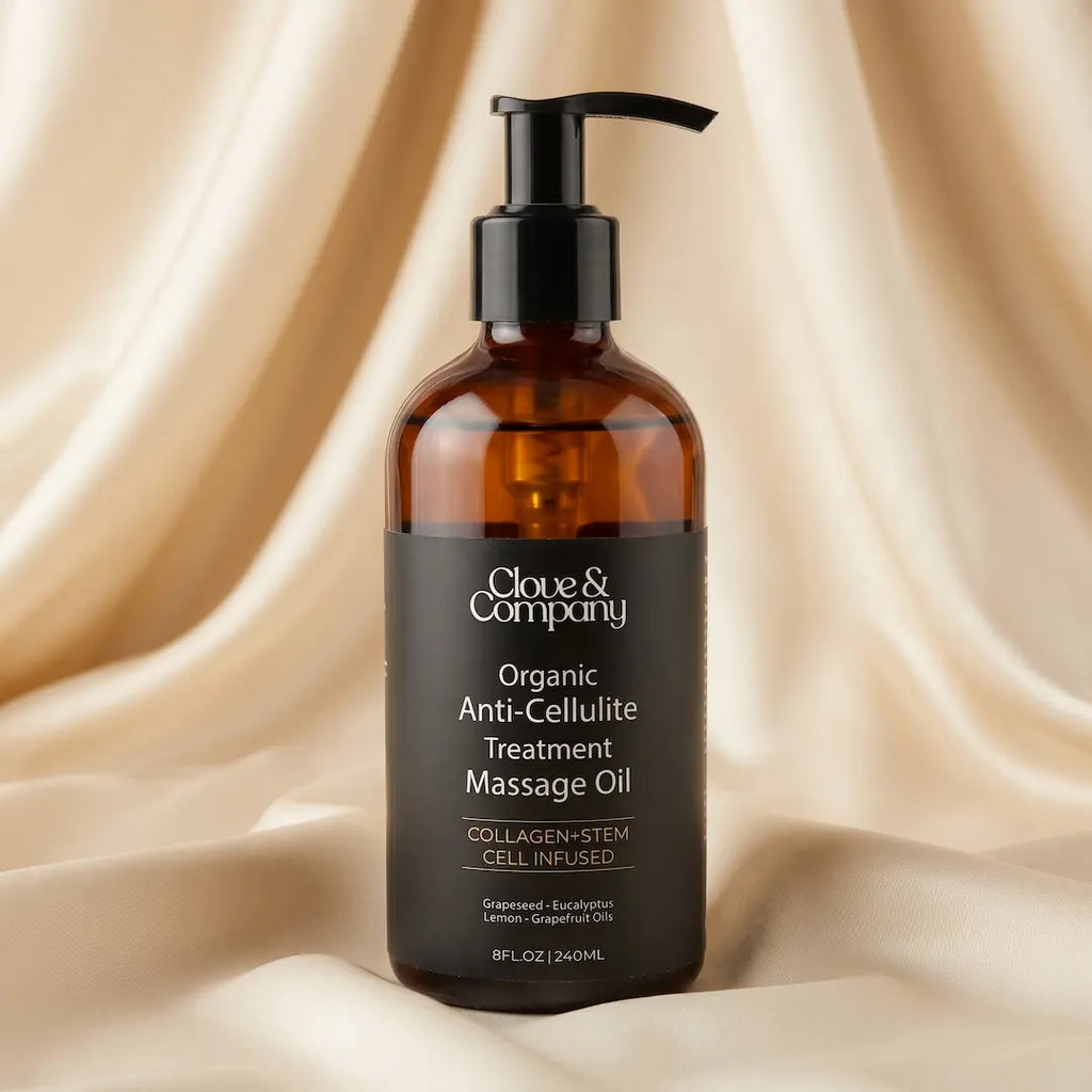 An 8 fl oz amber glass pump bottle of Clove & Company Organic Anti-Cellulite Treatment Massage Oil.